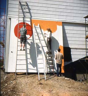 View of the mural on the barn while originally being painted